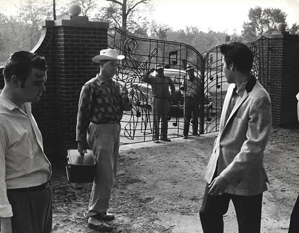 Elvis Presley with Arthur Hooten (far left) at Graceland April 22, 1957.