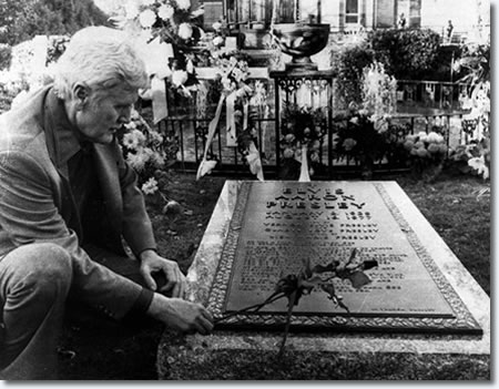Vernon Presley at Elvis' grave at Graceland.